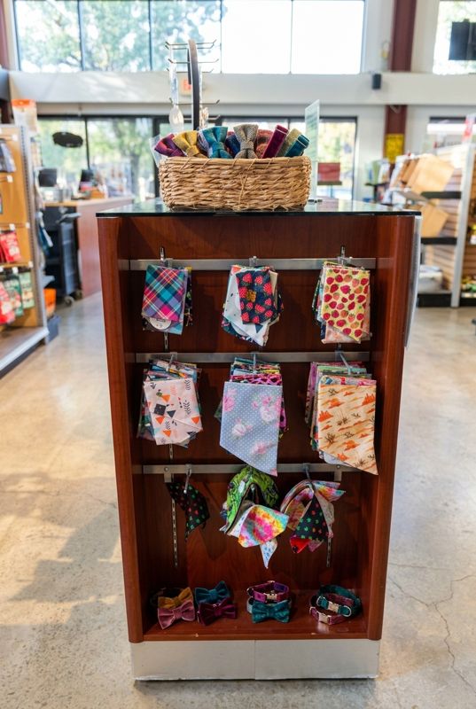 A spinner of patterned bandanas and bow ties